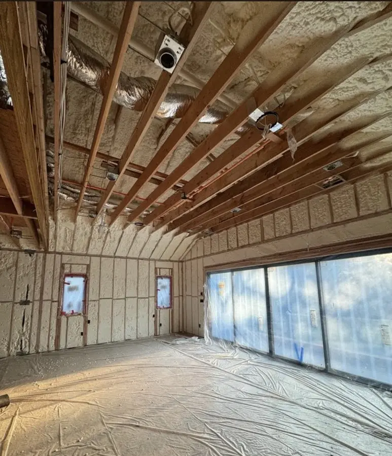 Interior walls and ceiling insulated with spray foam during new construction in Sheridan